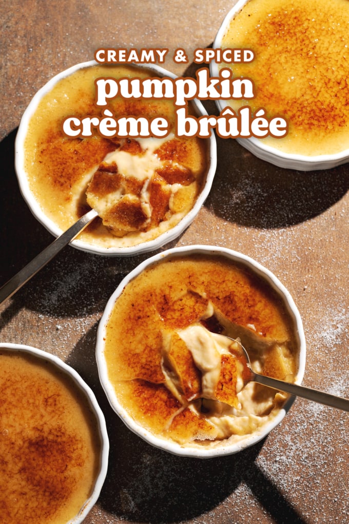 Four ramekins of pumpkin crème brûlée with torched sugar toppings.