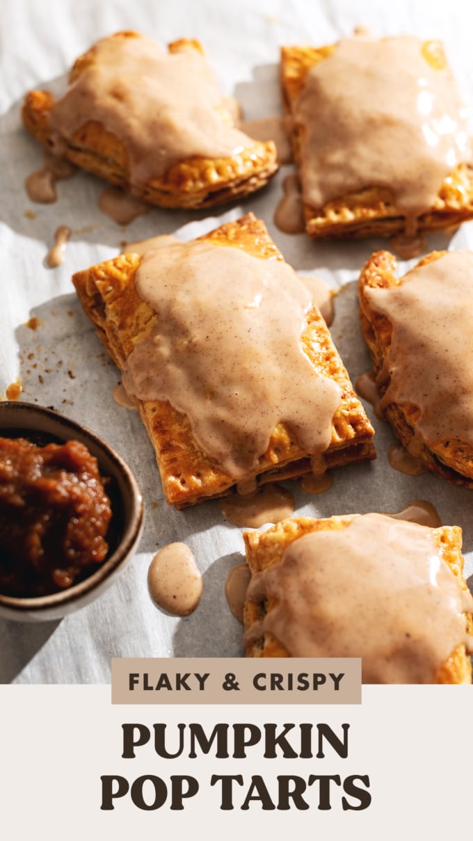 Pumpkin pop tarts with icing dripping down the sides.