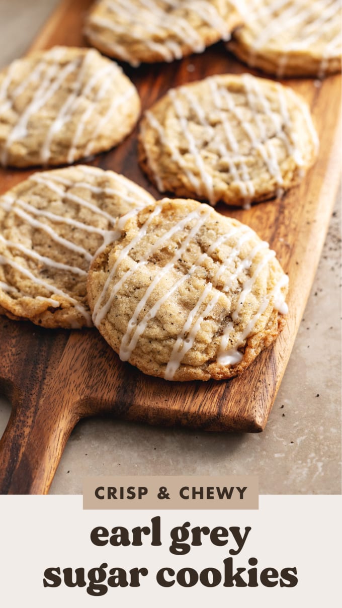 Earl grey sugar cookies sitting on a wooden board.