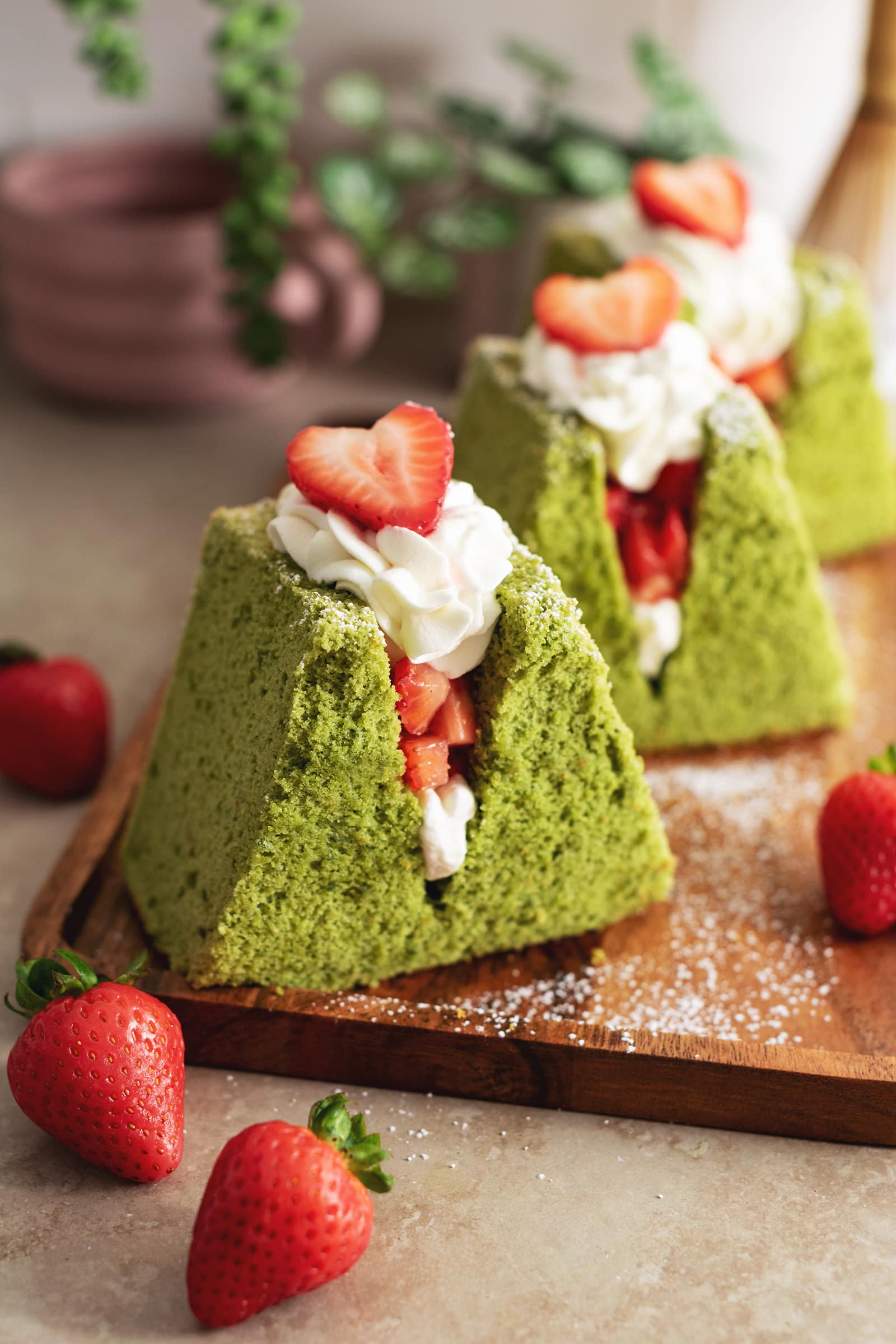 Close-up of a matcha chiffon cake sandwich to show the spongey cake texture.