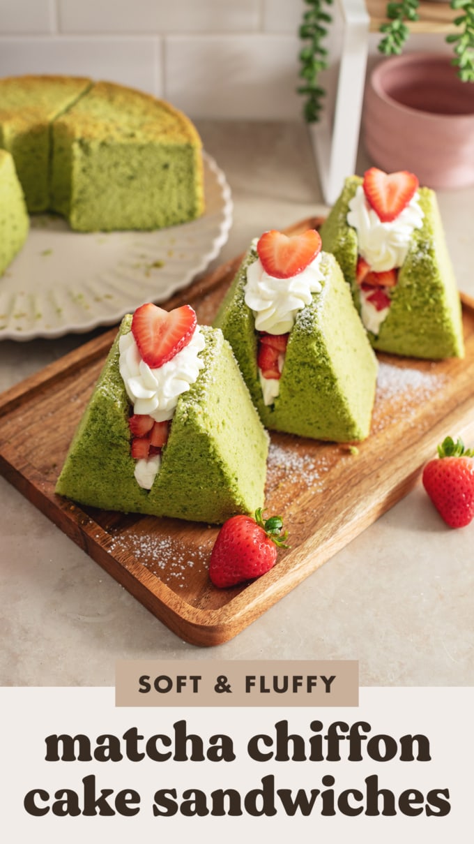 Three matcha chiffon cake sandwiches lined up on a wooden platter.