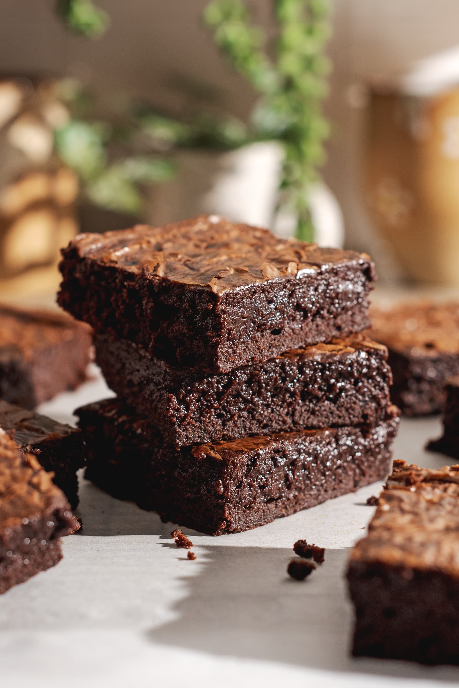A stack of three miso brownies surrounded by more brownies.