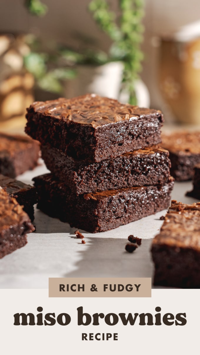 A stack of three miso brownies surrounded by more brownies.