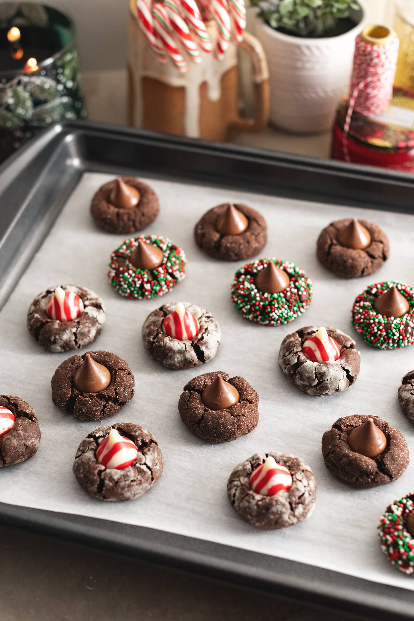 Baked chocolate blossom cookies on a baking sheet.