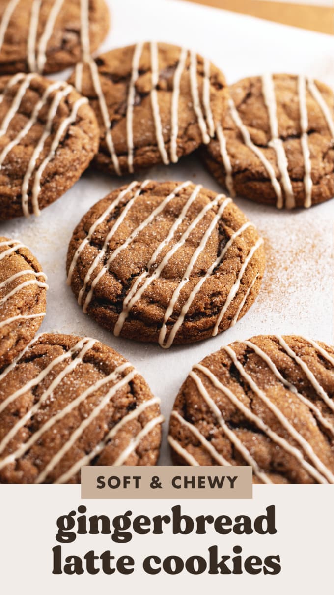 Gingerbread latte cookies drizzled with icing scattered on parchment paper.