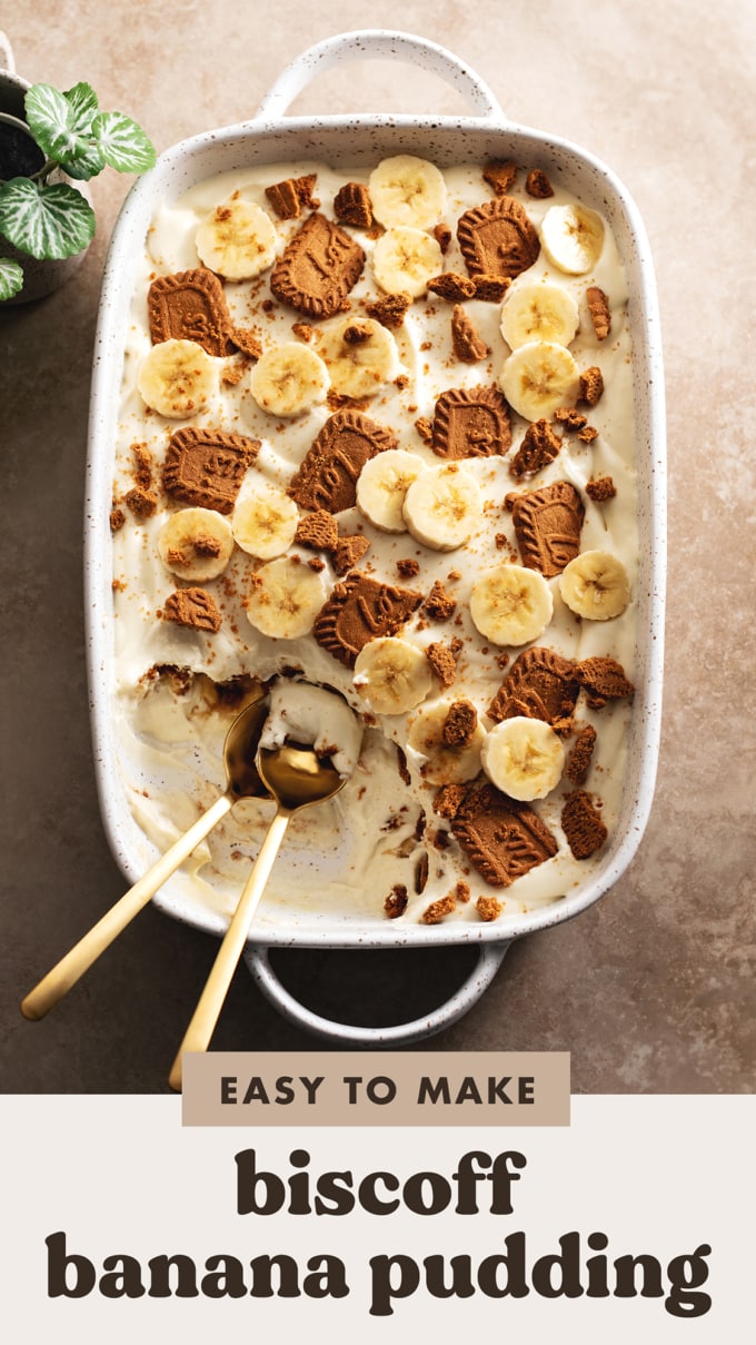 Top down view of a serving dish full of biscoff banana pudding with a corner scooped out.