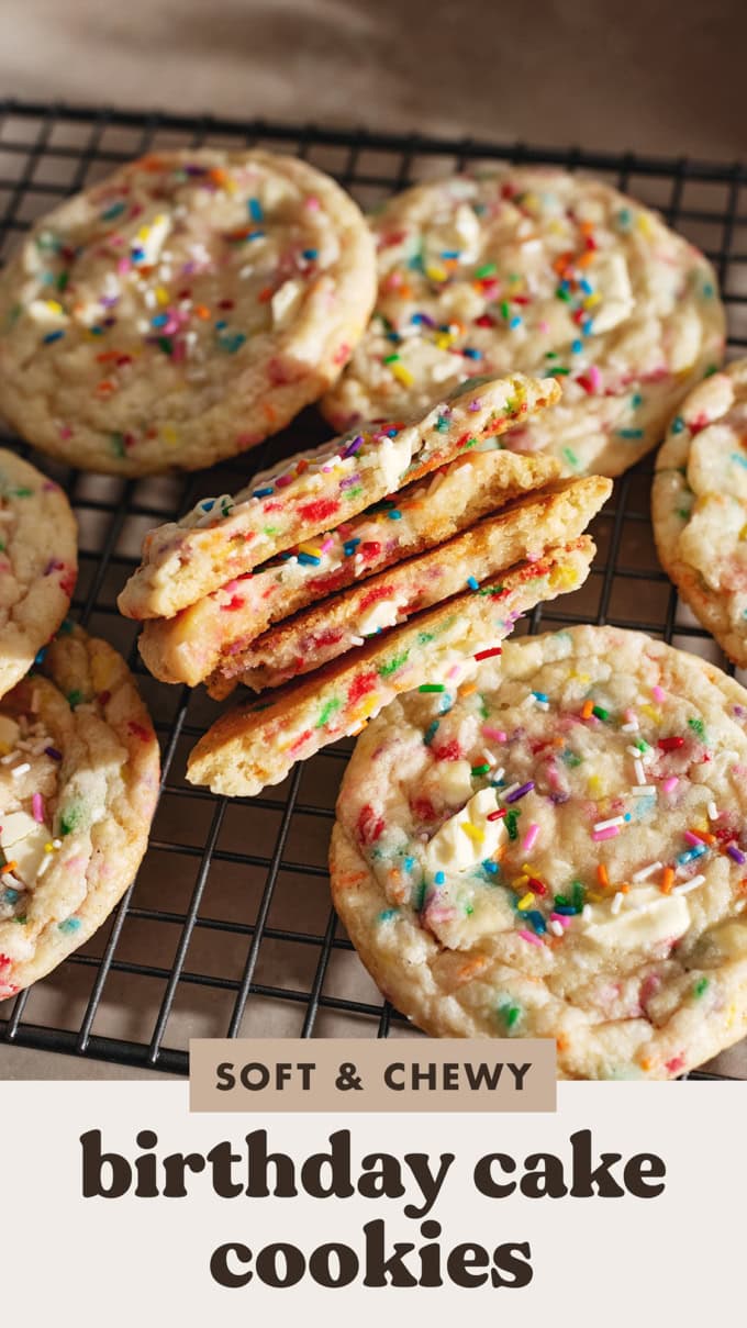 A stack of birthday cake cookies cut in half to show the texture inside.