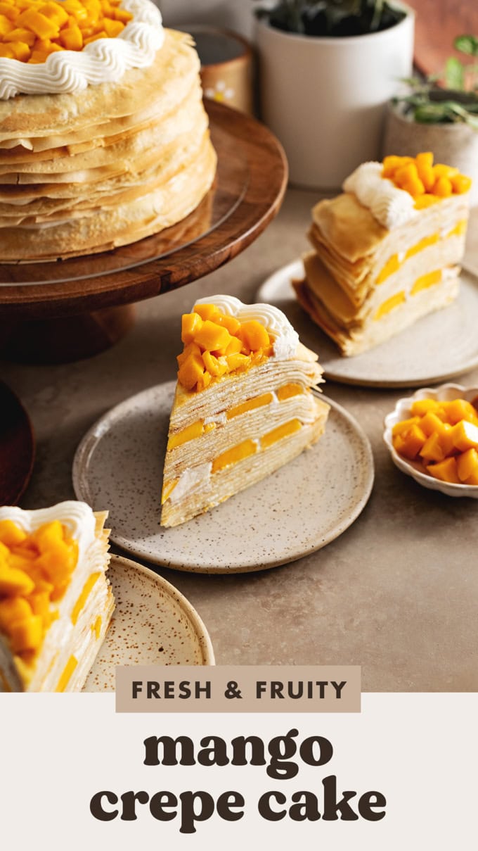 Three slices of mango crepe cake on plates in front of the rest of the cake on a cake stand.