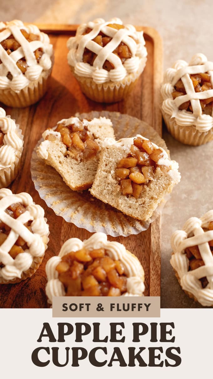 An apple pie cupcake cut in half to show the apple compote filling inside.