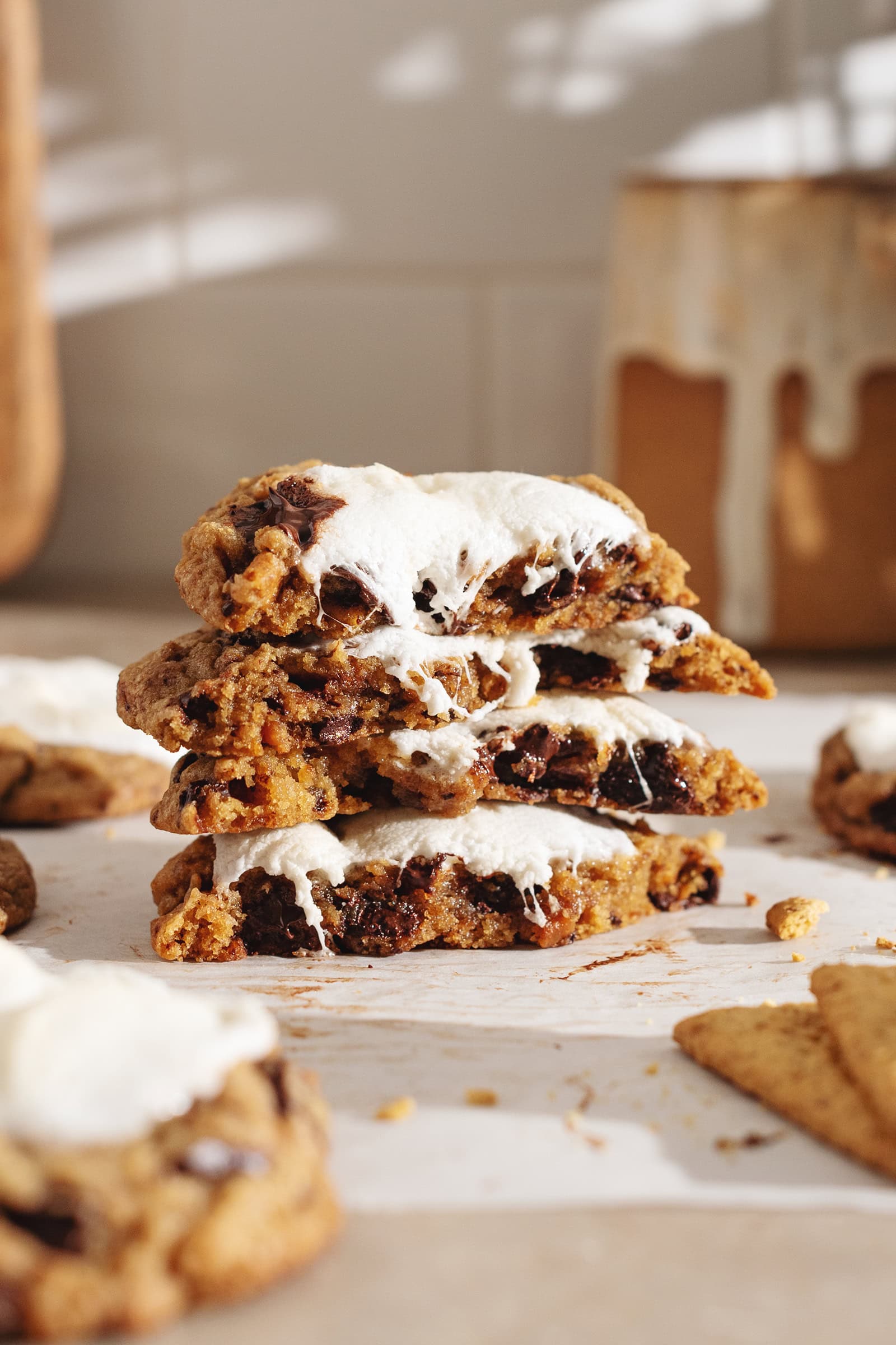 A stack of chocolate chip s'mores cookies cut in half.