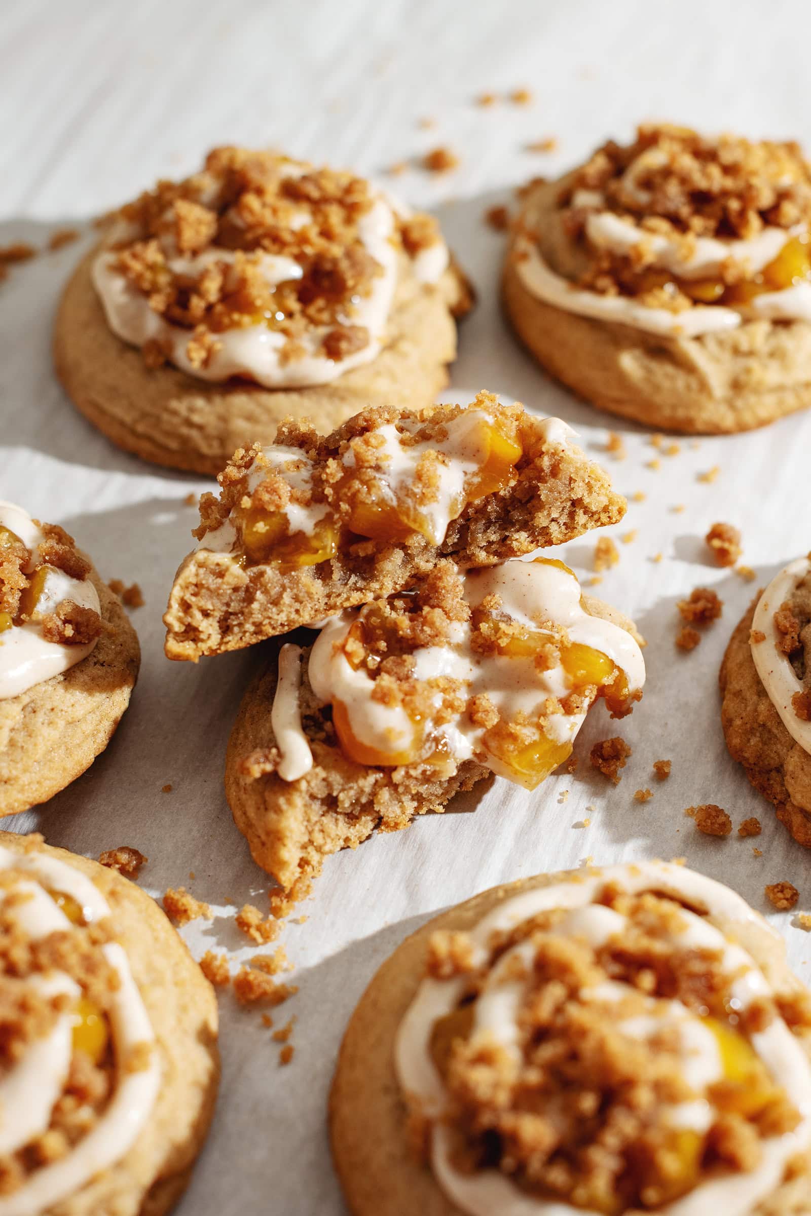 Two peach cobbler cookies cut in half and stacked on top of each other.