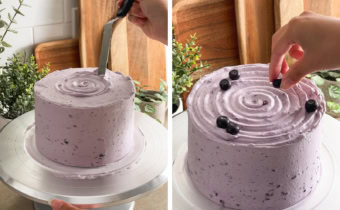 Left: making a swirl design on top of a cake with a spatula. Right: hand placing a blueberry on top of a blueberry cake.