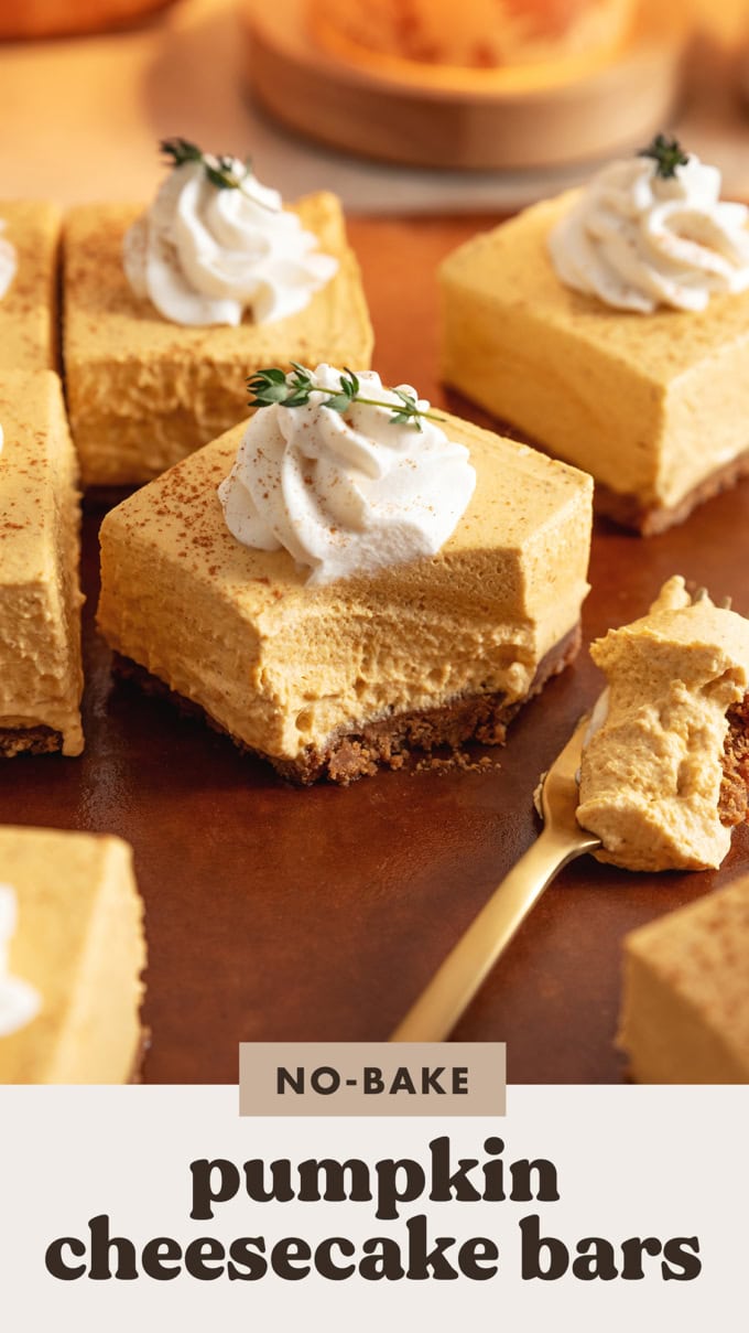 A no-bake pumpkin cheesecake bar with a scoop taken out of it to show the texture.