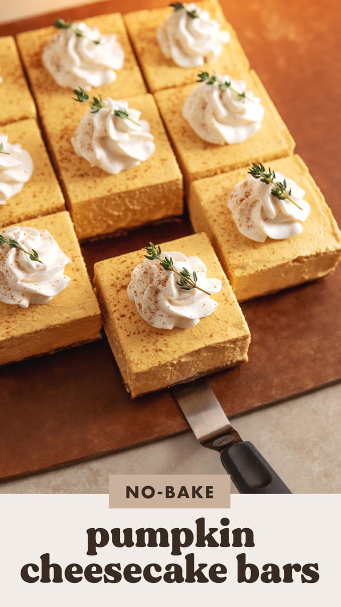 Pulling out a square of no-bake pumpkin cheesecake bar from the rest of the bars.