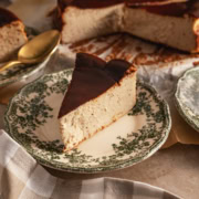 A slice of earl grey basque cheesecake on a floral plate.