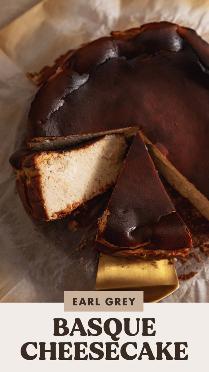 A slice of earl grey basque cheesecake laying on its side with another slice next to it.