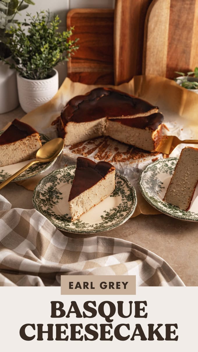 Slices of earl grey basque cheesecake on plates with the rest of the cheesecake in the back.