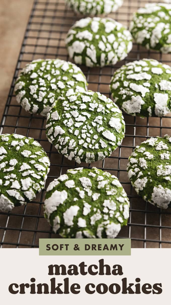 Matcha crinkle cookies scattered on a wire rack.