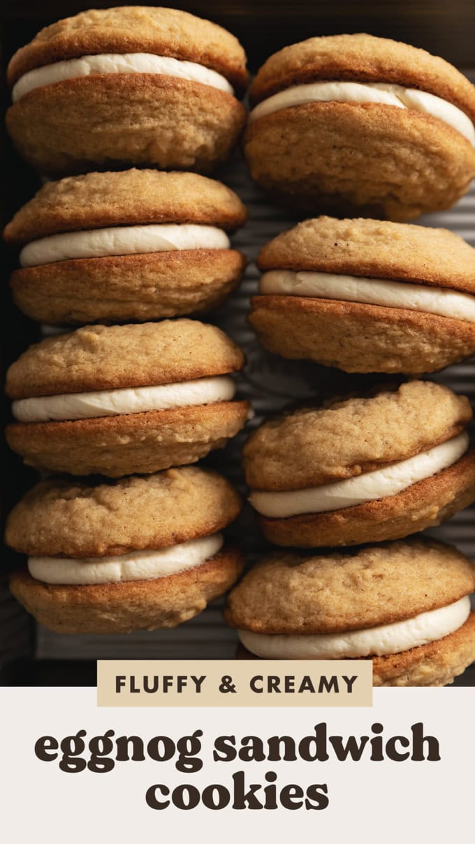Eggnog sandwich cookies lined up in a pan.