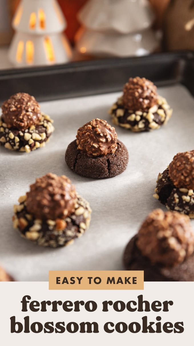 Ferrero rocher blossom cookies lined up on a baking sheet.