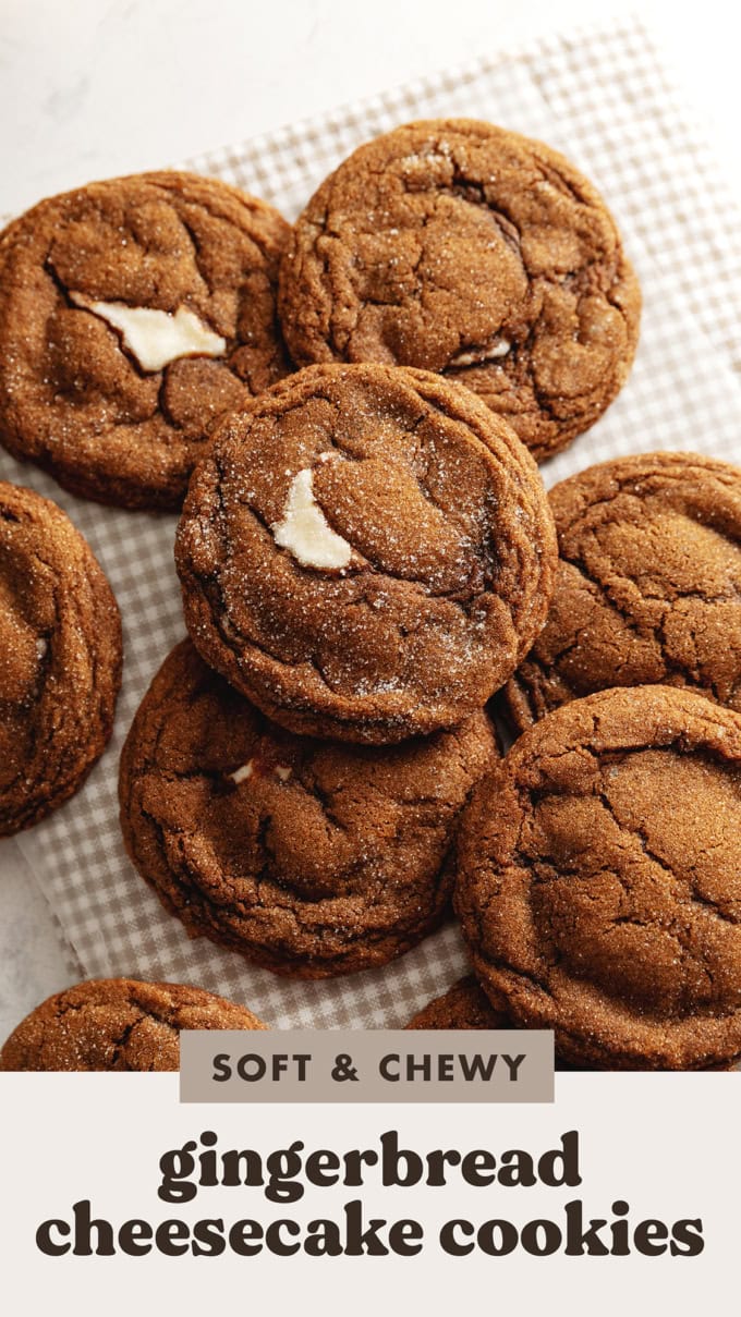 Gingerbread cheesecake cookies scattered on a counter.
