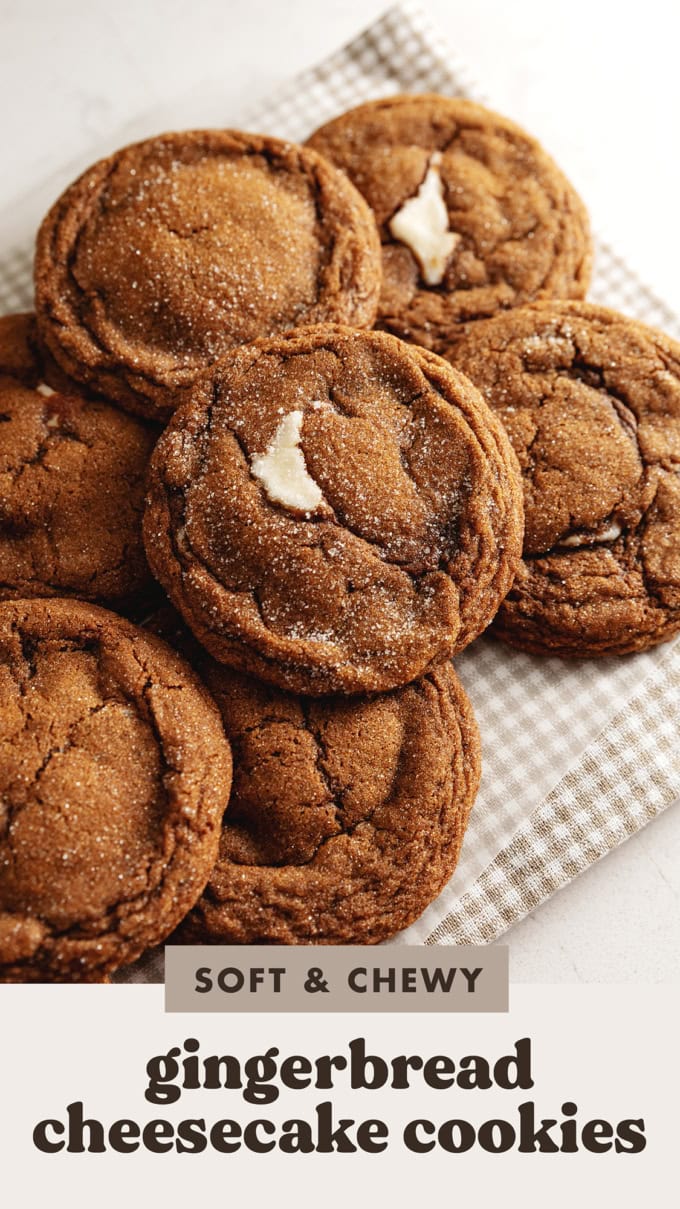 Gingerbread cheesecake cookies scattered on a counter.