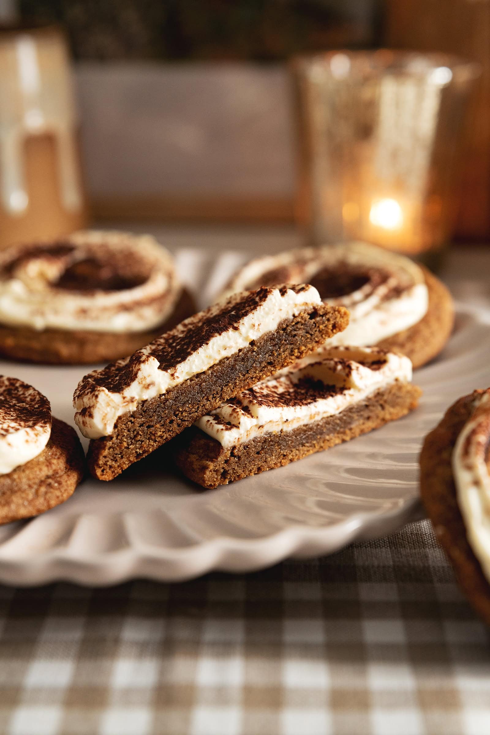 A tiramisu cookie cut in half to show a cross-section of the layers.