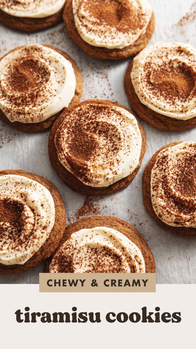 Overhead view of tiramisu cookies scattered on parchment paper.