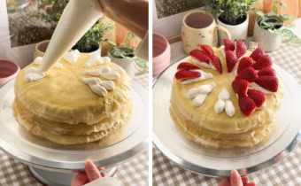 Left: piping whipped cream on top of a crepe cake. Right: a crepe cake with strawberries partially arranged on top.