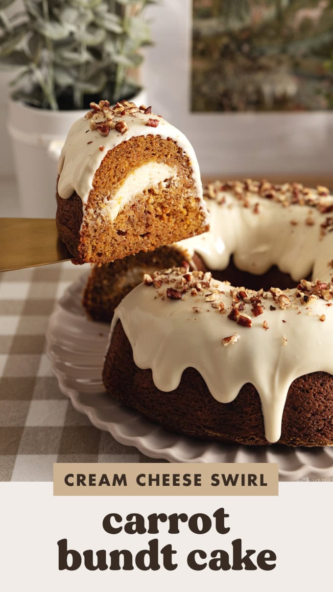 Two slices of carrot bundt cake leaning against each other next to the rest of the cake.