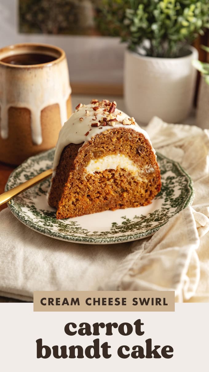 A slice of carrot bundt cake with a swirl of cream cheese in the middle on a green vintage plate.