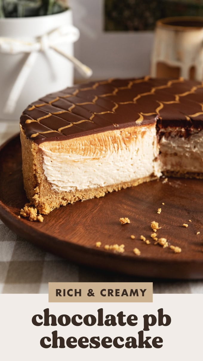 Cross-section of the cut edge of a chocolate peanut butter cheesecake to show the layers inside.