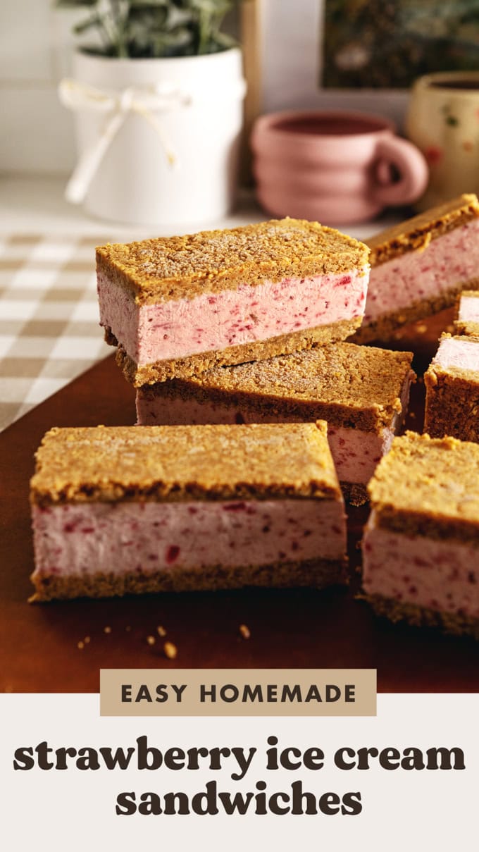 Strawberry ice cream sandwiches stacked on top of one another.