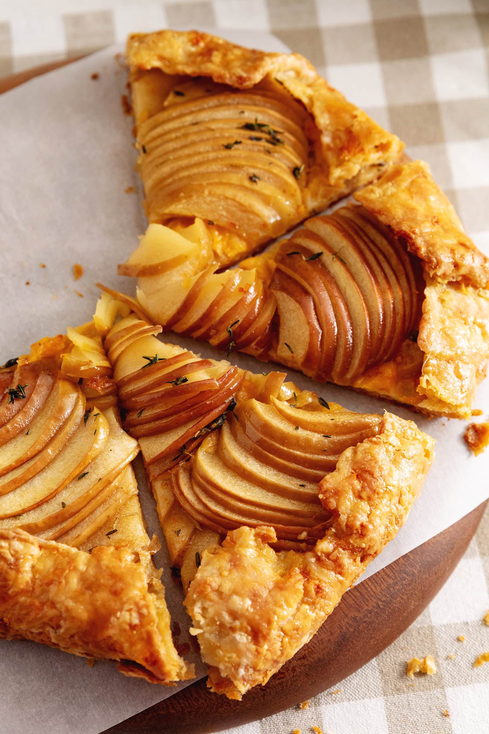 An apple cheddar galette cut into several slices.