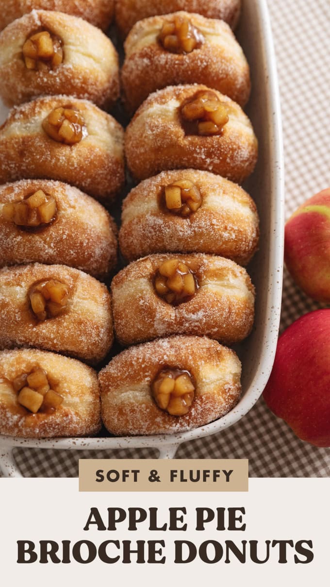 Two rows of apple pie donuts lined up in a baking dish.
