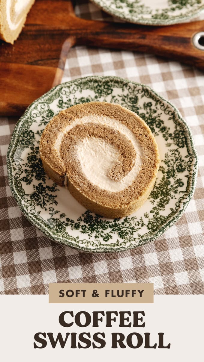 Top-down view of a slice of coffee swiss roll on a vintage plate.
