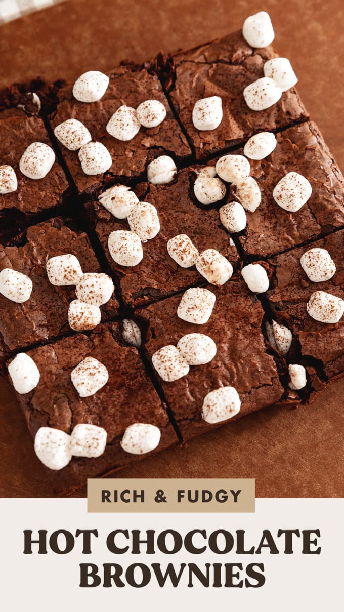 Hot chocolate brownies cut into squares with marshmallows on top.